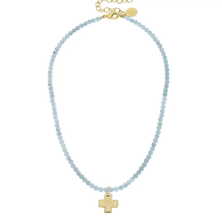 Gold Cross on Light Blue Beaded Necklace